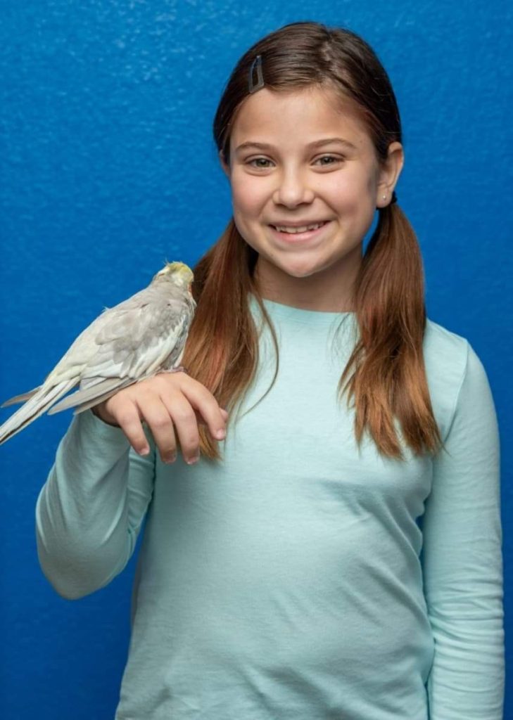 emma holding a bird