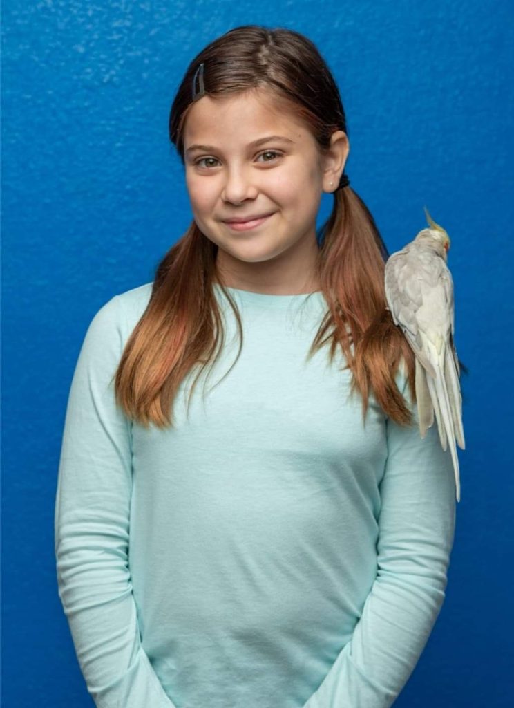 emma with bird on shoulder